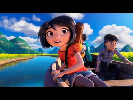 This image released by DreamWorks Animation shows characters Yi (left), voiced by Chloe Bennet, and Jin, voiced by Tenzing Norgay Trainor, in a scene from ‘Abominable’. 