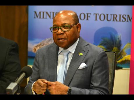Tourism Minister Edmund Bartlett speaking on Tuesday at a media briefing to provide an update on the performance of the sector. 