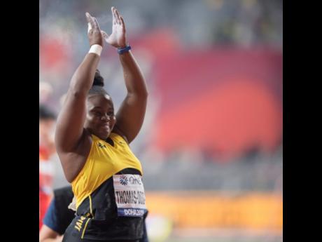 Danniel Thomas-Dodd celebrates after her final throw in the women shot put finals at the IAAF World Athletics Championships in Doha, Qatar, yesterday. Thomas-Dodd placed second in the event with a throw of 19.47m.