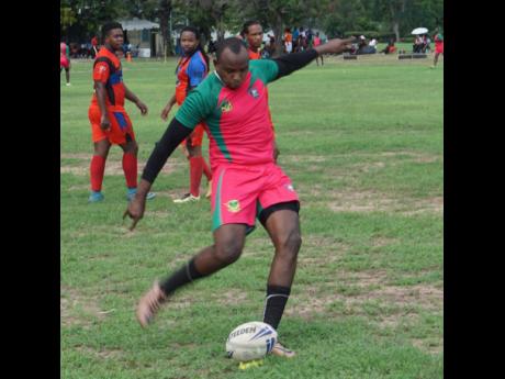 Eric Groves of West Kingston Hyenas kicks a goal in his team’s win over Liguanea Dragons during a recent Jamaica Rugby League Association National Knock Out match.