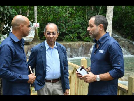 
Dr Horace Chang (centre), minister of national security, speaks with Chukka’s John Byles (left) and Marc Melville during the official launch of the Chukka zipline tour at Dunn’s River Falls in Ocho Rios, St Ann.   