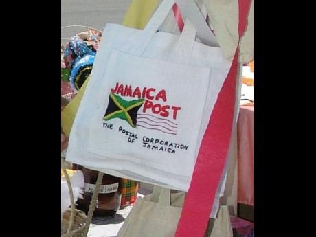 A Jamaica Post branded bag is seen on display at the Savanna-la-Mar Post Office. The Jamaica Postal Service implemented a large rate increase for its Fast Track service on which many small traders rely to send products overseas.