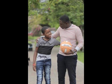 Managing director of the Friends of a Child Help Foundation Jason Evans with mentee Richardo Whyte.  