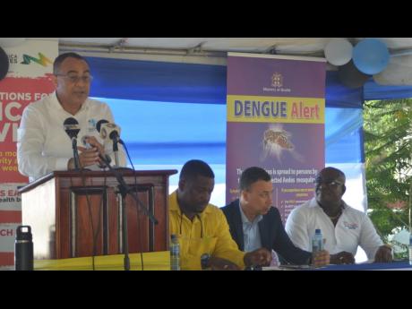 Health and Wellness Minister Dr Christopher Tufton (left) delivering the keynote address at Green Pond Health Centre, which has been adopted by the Atlanta Montego Bay Sister Cities Committee under the health ministry’s Adopt-a-Clinic Programme, last Friday. Looking on from second left are Heroy Clarke, member of parliament for Central St James; Mark McGann, councillor for the Somerton division; and Lennox Wallace, acting parish manager for the St James Public Health Services.