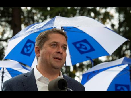 Conservative leader Andrew Scheer speaks during a campaign rally in Vancouver yesterday. 