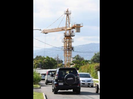The crane which has been heightening tension at a construction site along Wellington Drive in St Andrew.