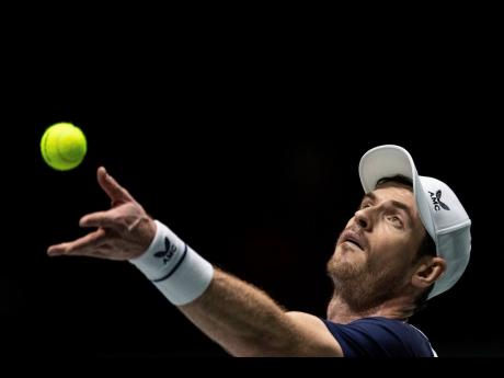 Great Britain’s Andy Murray serves during the Davis Cup tennis match against Netherlands’ Tallon Griekspoor in Madrid, Spain, yesterday. Murray won the match 6-7 (7), 6-4, 7-6 (5).