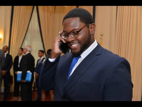 Samuel Bailey, 23, breaks the news to his mom that he was moments earlier named the 2020 Rhodes Scholar. Governor General Sir Patrick Allen made the announcement at King’s House on Thursday. 