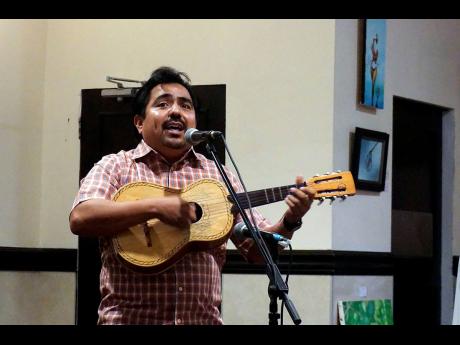 Manuel Lopez Gonzales, second secretary in the Embassy of Mexico in Jamaica, performs at ArtBeats’ fifth annual fine arts showcase at The Jamaica Pegasus hotel on Sunday, November 24.