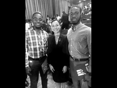 
Sandre Rhoden (left) with Senator Kamina Johnson Smith, minister of foreign affairs and foreign trade, and Sayeed Bernard.