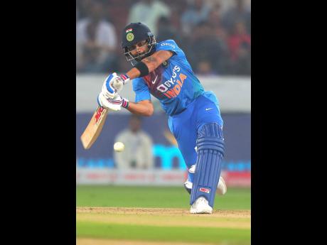 India’s captain Virat Kohli bats during the first Twenty20 international cricket match between India and West Indies in Hyderabad, India, yesterday. India won by six wickets.