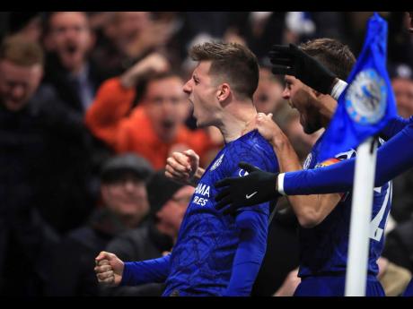 Chelsea’s Mason Mount celebrates scoring his side’s second goal of the game against Aston Villa during their English Premier League match at Stamford Bridge in London, England, on Wednesday.