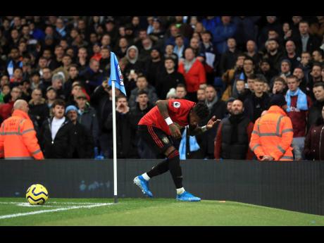 
Manchester United’s Fred reacts after objects are thrown at him during the English Premier League match at the Etihad Stadium, Manchester, England, yesterday.