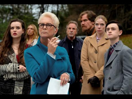 Katherine Langford, from left, Toni Collette, Jamie Lee Curtis, Don Johnson, Michael Shannon, Riki Lindholm and Jaeden Lieberher in a scene from ‘Knives Out.’ 