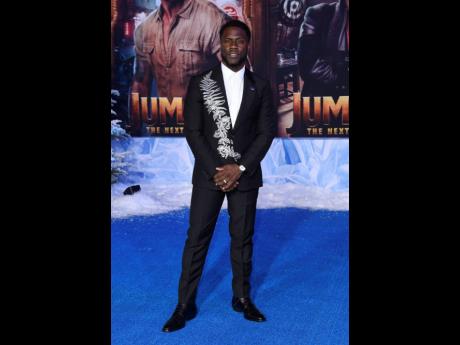 Kevin Hart poses for photographers at the Los Angeles premiere of ‘Jumanji: The Next Level’, at the TCL Chinese Theatre, on Monday.