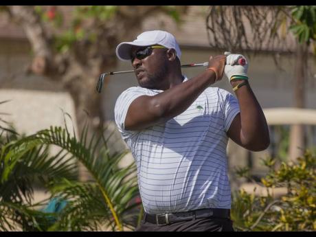 Wesley Brown in action on Day One of the three-day Alacran Jamaica Open at the Tryall Golf Club in Hanover yesterday.
