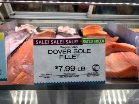 AP 
In this December 17, 2019 photo, wild-caught Dover sole from Oregon waters is sold in a grocery store seafood case in Lake Oswego, Oregon. Dover sole is a species of groundfish, which as a group has been under strict catch quotas to try to save nine overfished species. 