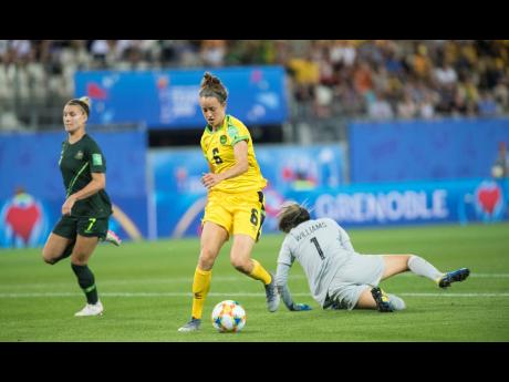 National senior women’s team footballer Havana Solaun scores Jamaica’s first ever goal at the FIFA Women’s World Cup against Australia at the Stade des Alpes in Grenoble, France, on Tuesday, June 18, 2019.