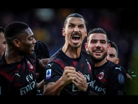 AP
Milan’s Zlatan Ibrahimovic celebrates with teammates after scoring his side’s second goal during an Italian Serie A soccer match between Cagliari and Milan in Cagliari, Saturday, Jan. 11, 2020. 