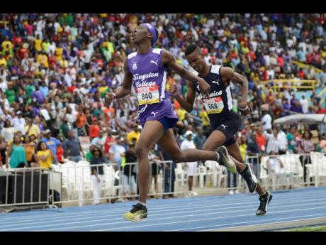 Giovouni Henry (left) of Kingston College wins the Class Two Boys 800m event ahead of Jamaica College’s J’Voughnn Blake at the ISSA/GraceKennedy Boys and Girls’ Athletics Championships at the National Stadium in Kingston on Saturday, March 30, 2019.