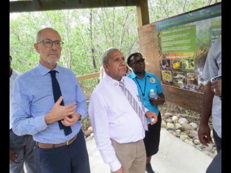 From left: French Ambassador Denys Wibaux, May Pen Mayor Winston Maragh and councillor of the Palmers Cross division, Carlene Benjamin, touring the Portland Bight Discovery Centre in Salt River, Clarendon, earlier this month.