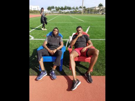 
Two of the country’s top 400m runners, Nathon Allen (left) and Akeem Bloomfield, relaxing after a hard training session at Florida Atlantic University recently.