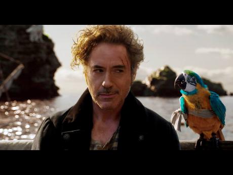 Dr John Dolittle (Robert Downey Jr) and parrot Polynesia (Emma Thompson) in ‘Dolittle’, directed by Stephen Gaghan.