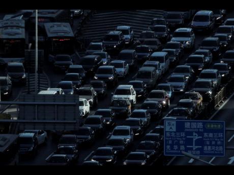 
This December 11, 2018 file photo, shows morning rush-hour traffic in Beijing, China. 