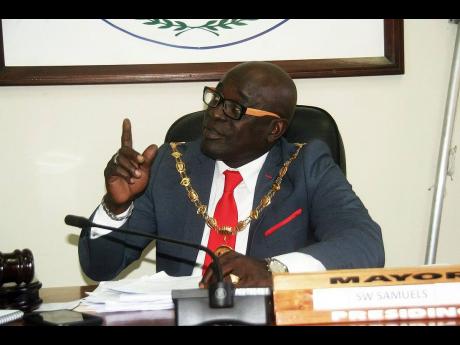Mayor of Lucea Sheridan Samuels has been reprimanded by Local Government Minister Desmond McKenzie.