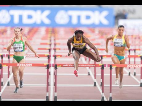 Jamaica’s Danielle Williams (centre) competes in the women’s 100m hurdles event at the 2019 IAAF World Athletic Championships at the Khalifa International Stadium in Doha, Qatar on Saturday October 5, 2019.