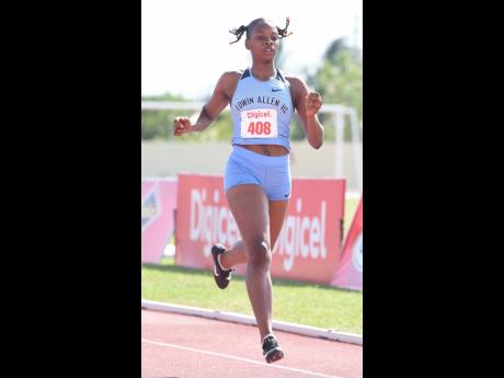 Kevona Davis of Edwin Allen High wins heat two of the  Class One girls 200 metres on yesterday’s day one of the two-day Digicel Central Championships at GC Foster College of Physical Education and Sport. Davis clocked 23.59 seconds.