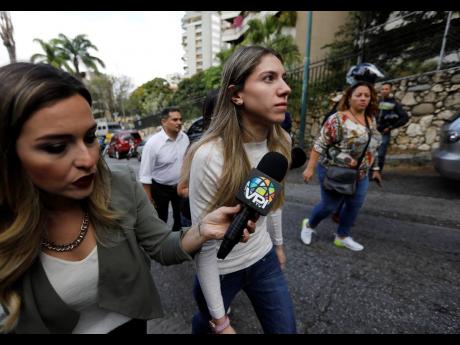 Fabiana Rosales, the wife of opposition leader Juan Guaidó, arrives at the building where the family of her husband’s uncle, Juan José Márquez, lives. 