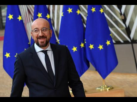 AP 
European Council President Charles Michel arrives for an EU summit at the European Council building in Brussels, on Thursday, February 20. After almost two years of sparring, the EU will be discussing the bloc’s budget to work out Europe’s spending plans for the next seven years. 