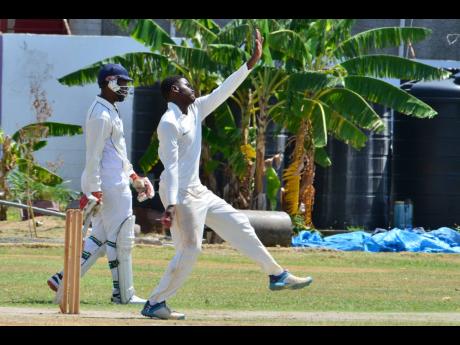St George’s College Under-19 cricket team captain Nicholas Lewin bowls a delivery during their ISSA Grace Shield match against rivals and hosts Kingston College on Thursday.