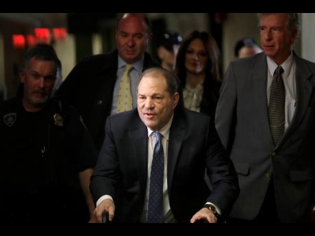 Harvey Weinstein arrives at a Manhattan courthouse for jury deliberations in his rape trial on Monday in New York. Weinstein was convicted of rape and sexual assault.