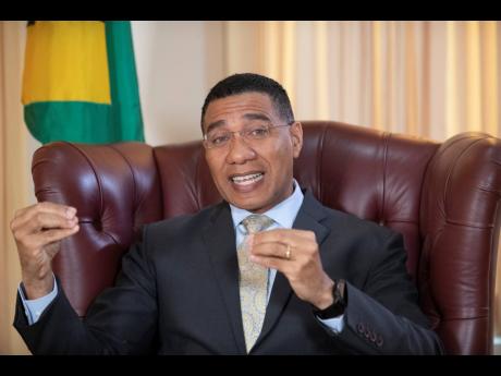 
Prime Minister Andrew Holness makes a point during a Gleaner interview at Jamaica House on Tuesday. Gladstone Taylor
