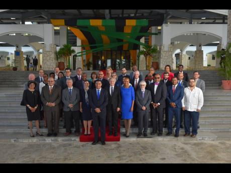 Prime Minister Andrew Holness (front, centre) poses for the camera with delegates following the fourth Energy and Climate Partnership of the Americas Ministerial Meeting, in Montego Bay. Also featured among the delegates are Foreign Affairs Minister Kamina Johnson Smith (right of Holness); Luis Almagro (left of Holness), secretary general of the Organization of American States; and Science, Energy and Technology Minister Fayval Williams (front, blue dress).