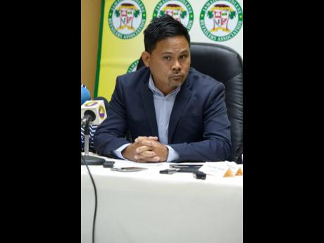 Gregory Chung, president of the Jamaica Gasolene Retailers Association, at a press conference at King’s Plaza on Saturday.