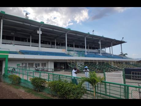 The grandstand, a free area, is empty yesterday as horse racing resumed at Caymanas Park  without spectators, after a two-meet break due to concerns over the coronavirus.