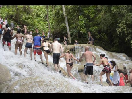 Tourists enjoying one of Jamaica’s attractions.