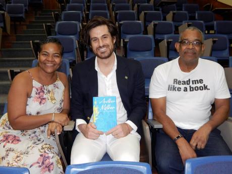 Author Ross Kenneth Urken (centre), flanked by his publishers, Christine Randle and Ian Randle.