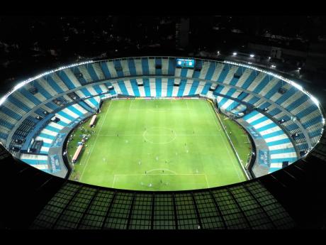 Peru’s Alianza Lima and Argentina’s Racing Club play a Copa Libertadores match at Estadio Presidente Peron in Buenos Aires, Argentina, on Thursday, March 12, 2020. The match was played in an empty, closed door stadium as part of the government’s measures to contain transmission of the novel coronavirus. 
