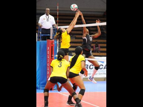 Jamaica’s senior women’s volleyball team in action at the CAZOVA Senior Women’s Championship at the National Indoor Sports Complex in 2017.