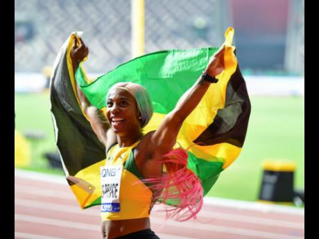 
Shelly-Ann Fraser-Pryce celebrates after her win in the women’s 100m final at the 2019 World Athletics Championships held at the Khalifa International Stadium in Doha, Qatar. Fraser-Pryce clocked an impressive 10.71 seconds.