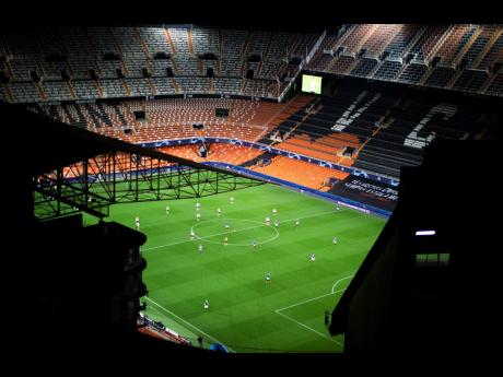 In this Tuesday March 10, 2020 file photo a general view of the Mestalla stadium during the Champions League round of 16 second leg football match between Valencia and Atalanta in Valencia, Spain.