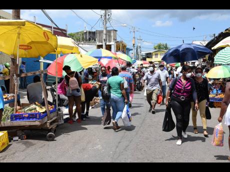 Shoppers flock in numbers in Linstead, St Catherine, on Saturday, April 25, 2020.  