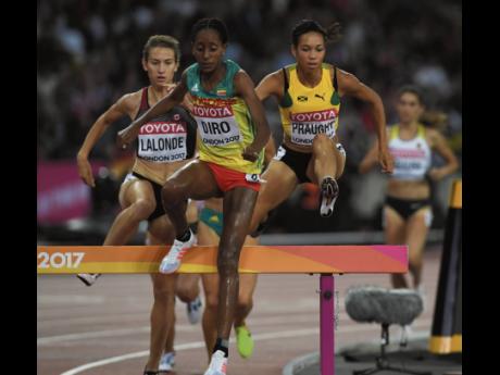 Jamaica’s Aisha Praught-Leer (right) in action during the women’s 3000m steeple chase final at the World Athletics Championships in London, England on Friday, August 11, 2017.