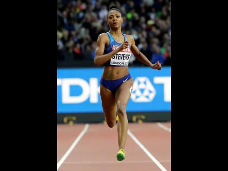 In this August 8, 2017, file photo, United States’ Deajah Stevens races in a women’s 200m first round heat during the World Athletics Championships in London. 