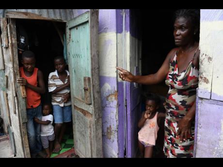 Christine Angus lives with her children and grandchildren in an eight-member household on Fort George Road, Annotto Bay, on Thursday. Annotto Bay was among three St Mary communities quarantined in the wake of a surge in coronavirus cases.