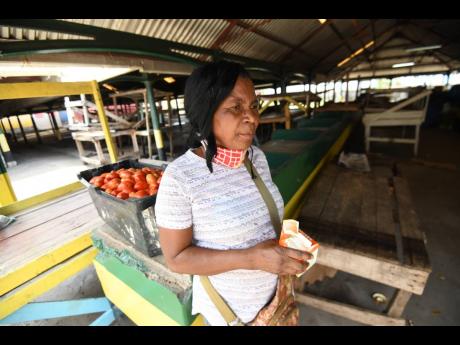 Sharon Carter who lives in St Catherine has been selling in the Metcalfe Market in Annotto Bay, St Mary, for the past 30 years. The area is currently under quarantine as a result of an outbreak of COVID-19 in the community.